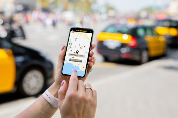 woman waiting for rideshare driver to pick her up