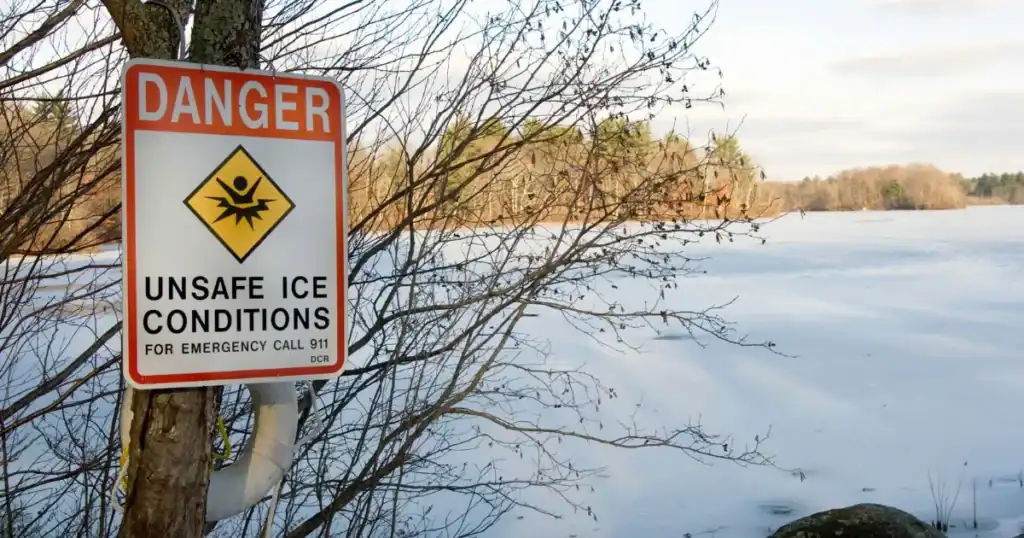 Danger of icy conditions sign outside of lake