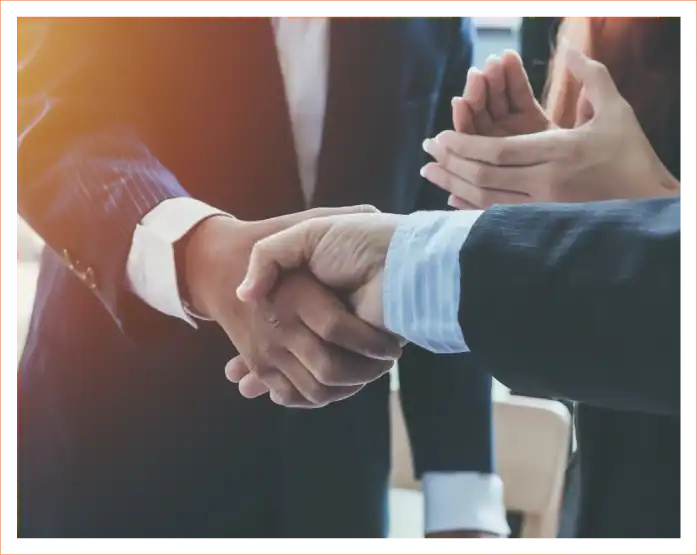 Professional handshake between attorneys symbolizing partnership at Palmisano & Goodman, personalinj.