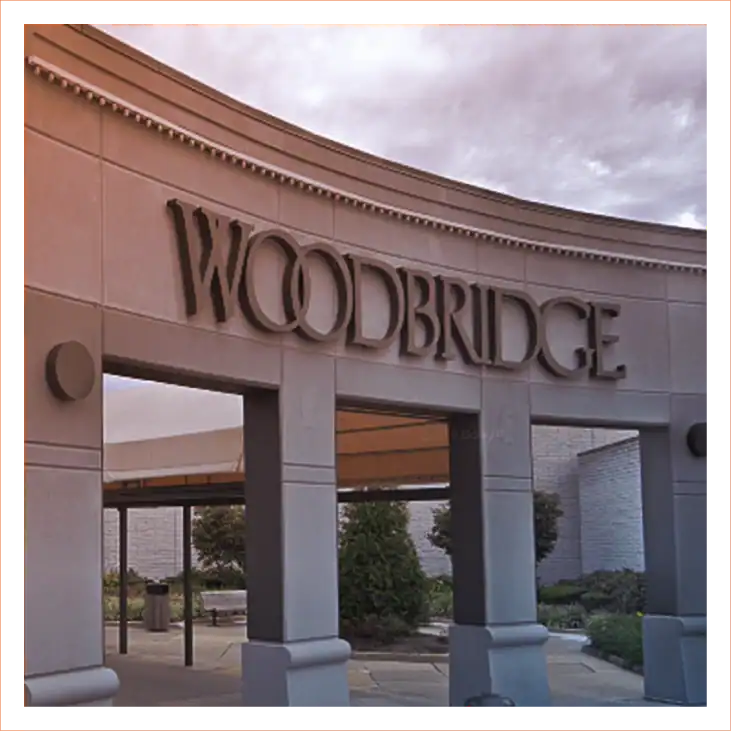 Palmsiano & Goodman logo arch exterior Woodbridge NJ law firm entrance for personal injury practice.